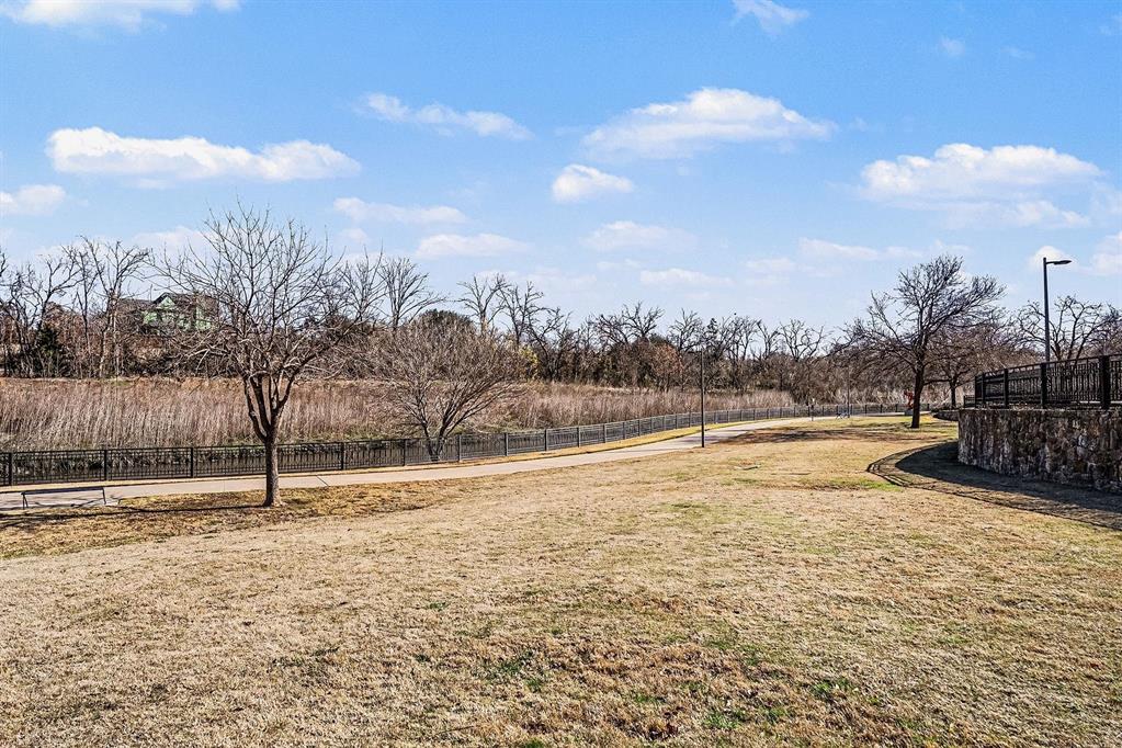 7011 Mistflower Ln. Dallas, TX 75231 - Photo 20 of 22 a view of yard with ocean view