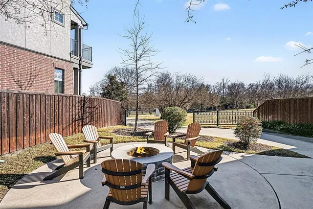 a view of a patio with furniture