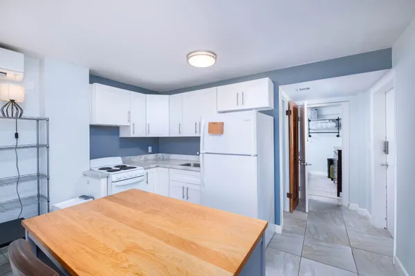 a room with storage and utility