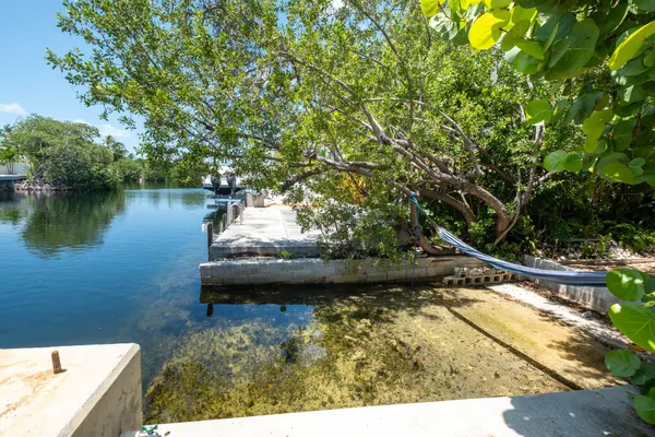 a view of a table and chairs in patio