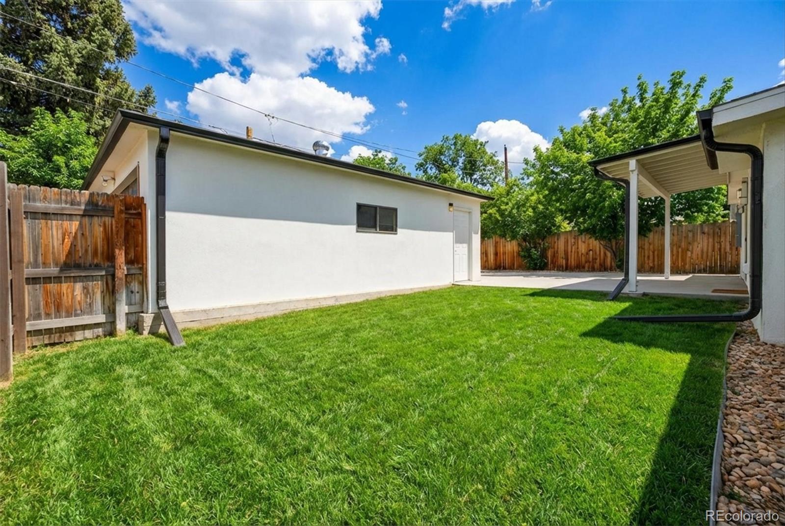765 Kearney Street Denver, CO 80220 - Photo 33 of 35 a house view with a garden space