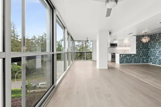 a view of a glass door with a balcony