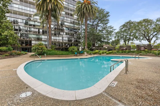 a view of a swimming pool with outdoor space