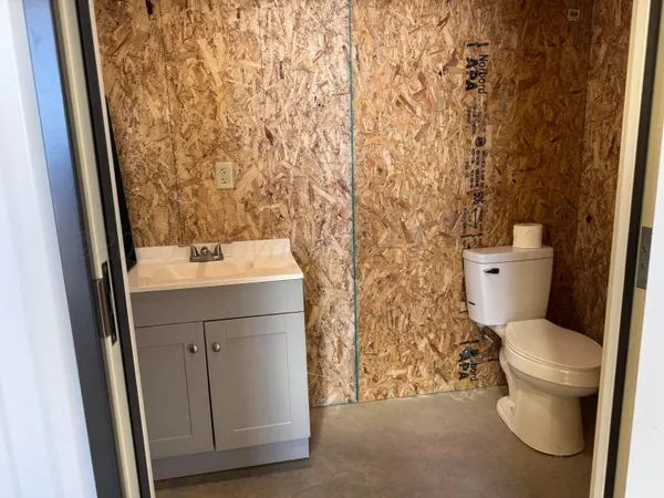 a bathroom with a sink and a toilet