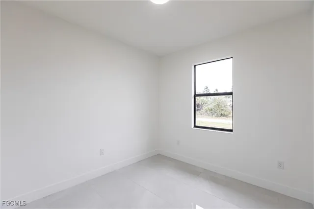 an empty room with a window