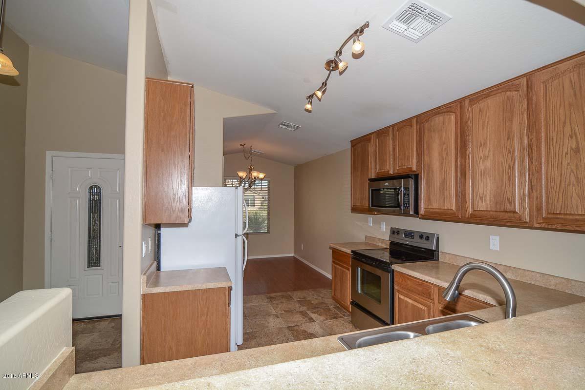 11927 West Dos Rios Drive Sun City, AZ 85373 - Photo 25 of 31 Kitchen