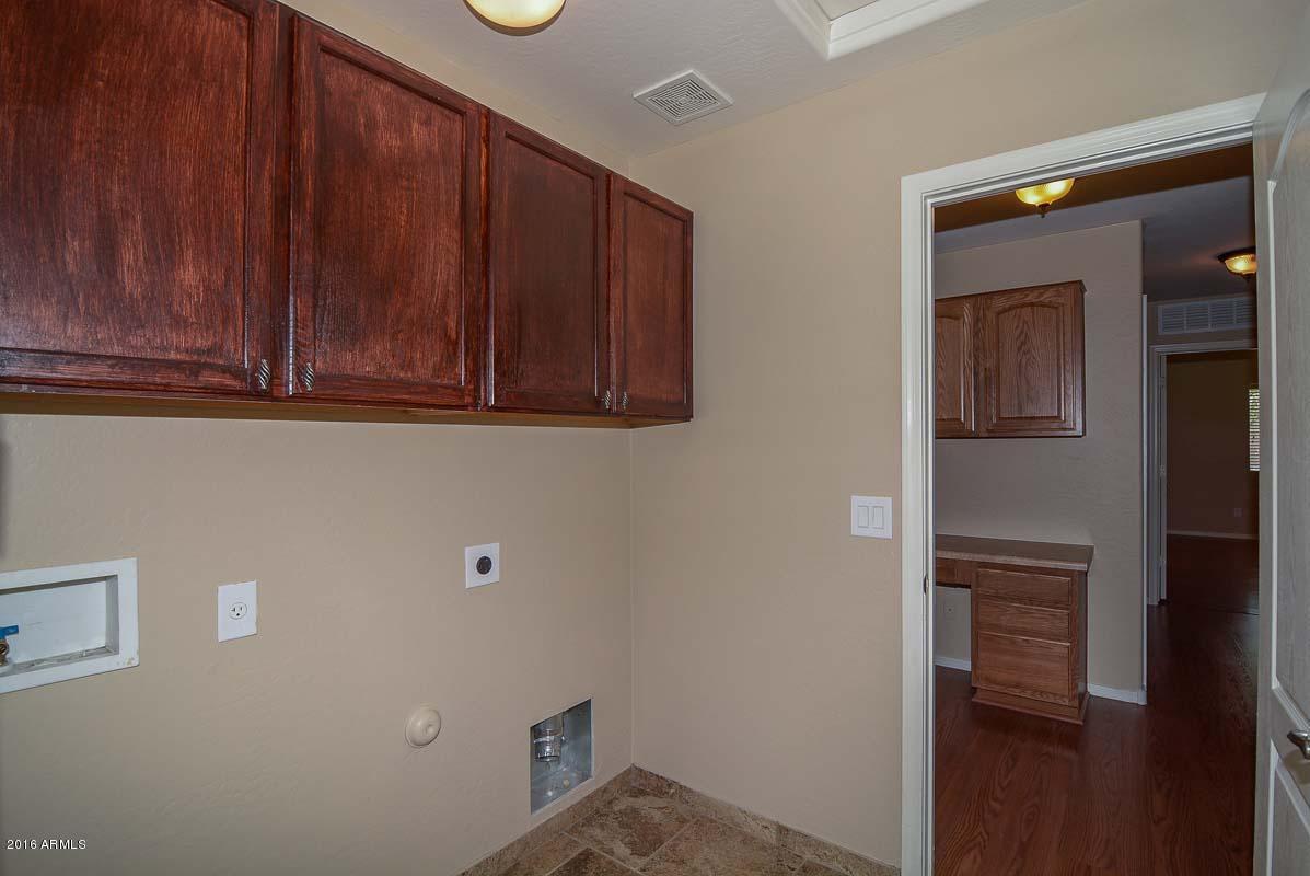 11927 West Dos Rios Drive Sun City, AZ 85373 - Photo 27 of 31 Laundry Room