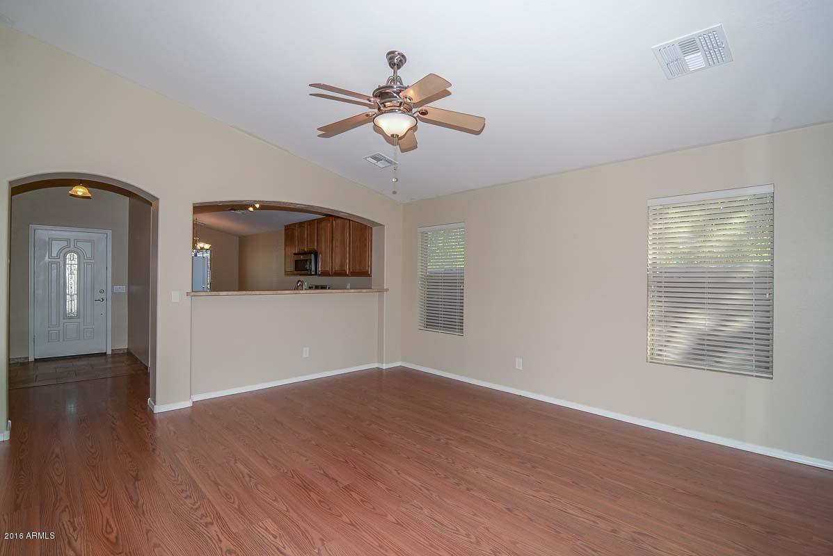 11927 West Dos Rios Drive Sun City, AZ 85373 - Photo 4 of 31 Living Room-Kitchen