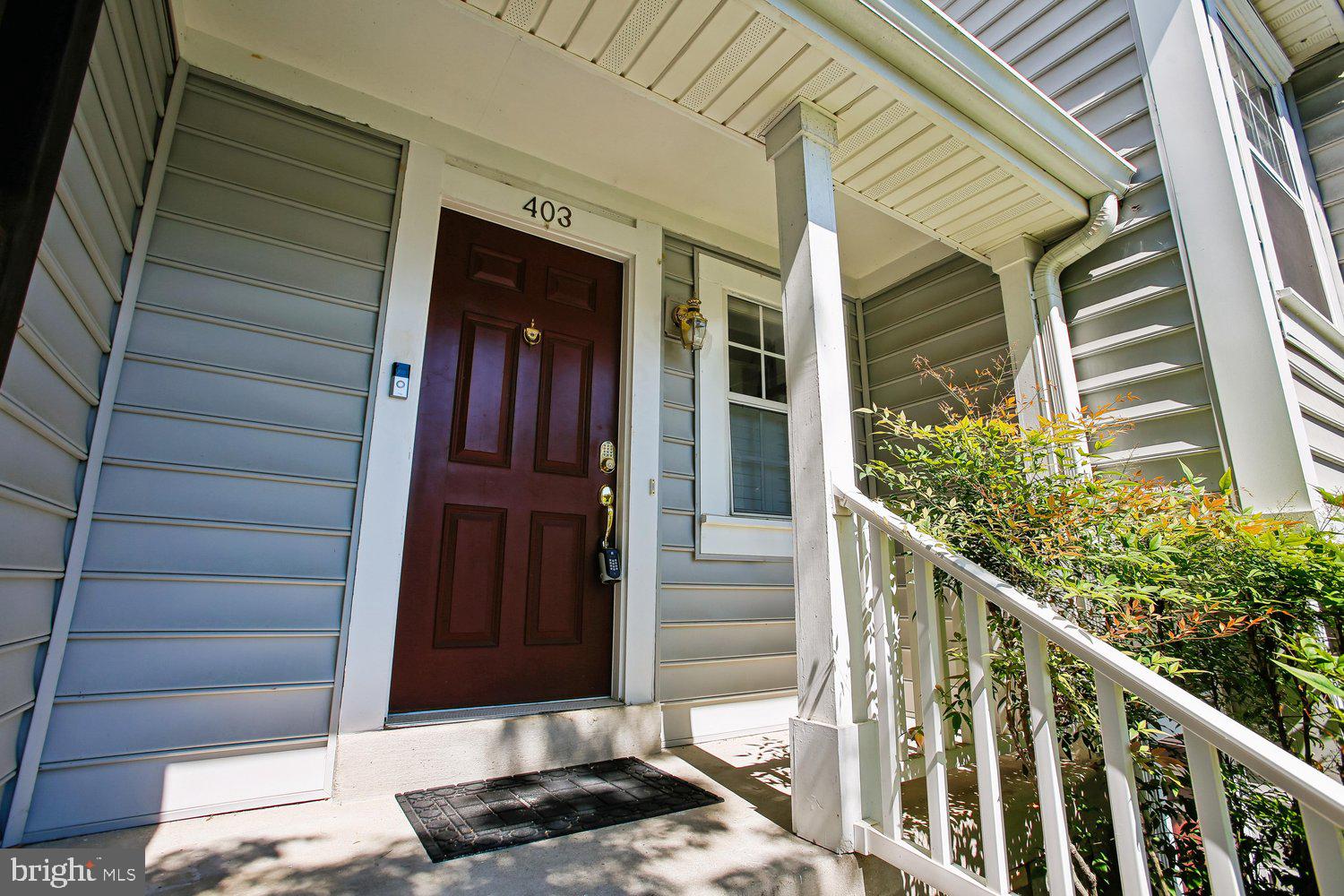 403 Fortress Way, Unit 403 Occoquan, VA 22125 - Photo 14 of 66 a view of a entryway door of the house