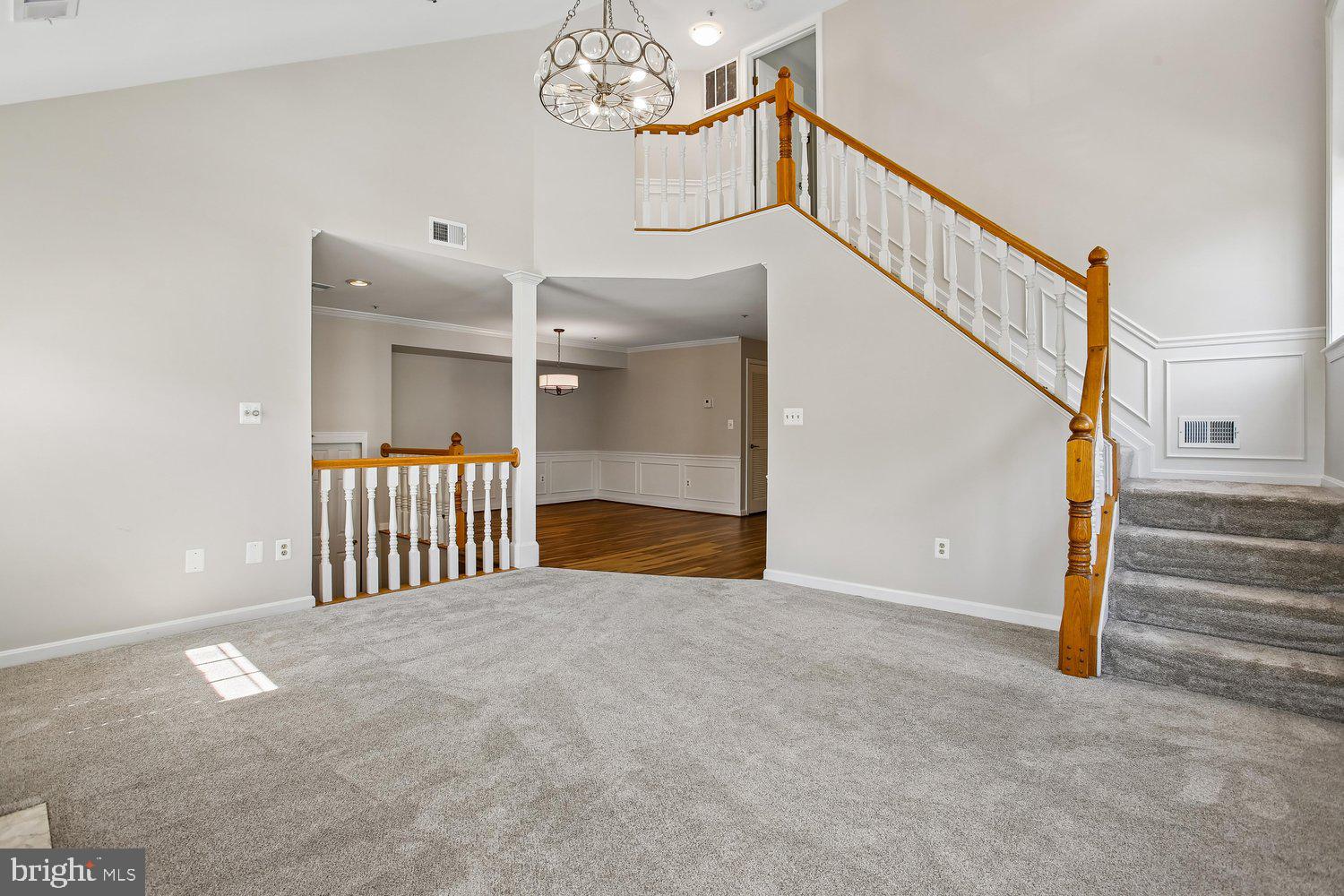 403 Fortress Way, Unit 403 Occoquan, VA 22125 - Photo 17 of 66 Inviting entryway with elegant staircase.
