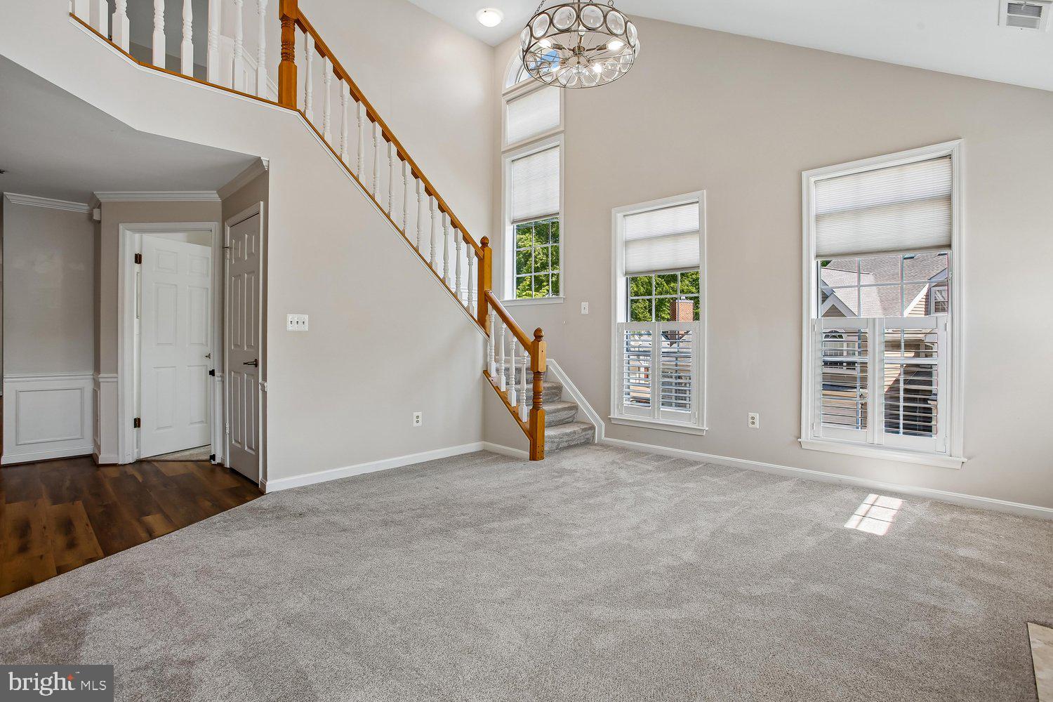 403 Fortress Way, Unit 403 Occoquan, VA 22125 - Photo 18 of 66 Bright and airy entryway with elegant staircase.