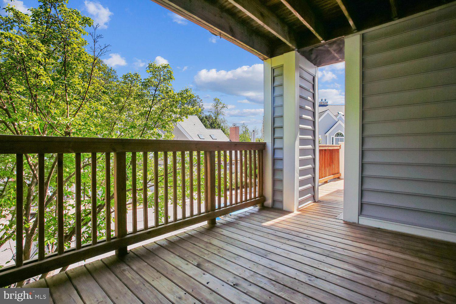 403 Fortress Way, Unit 403 Occoquan, VA 22125 - Photo 35 of 66 a view of a balcony with wooden floor