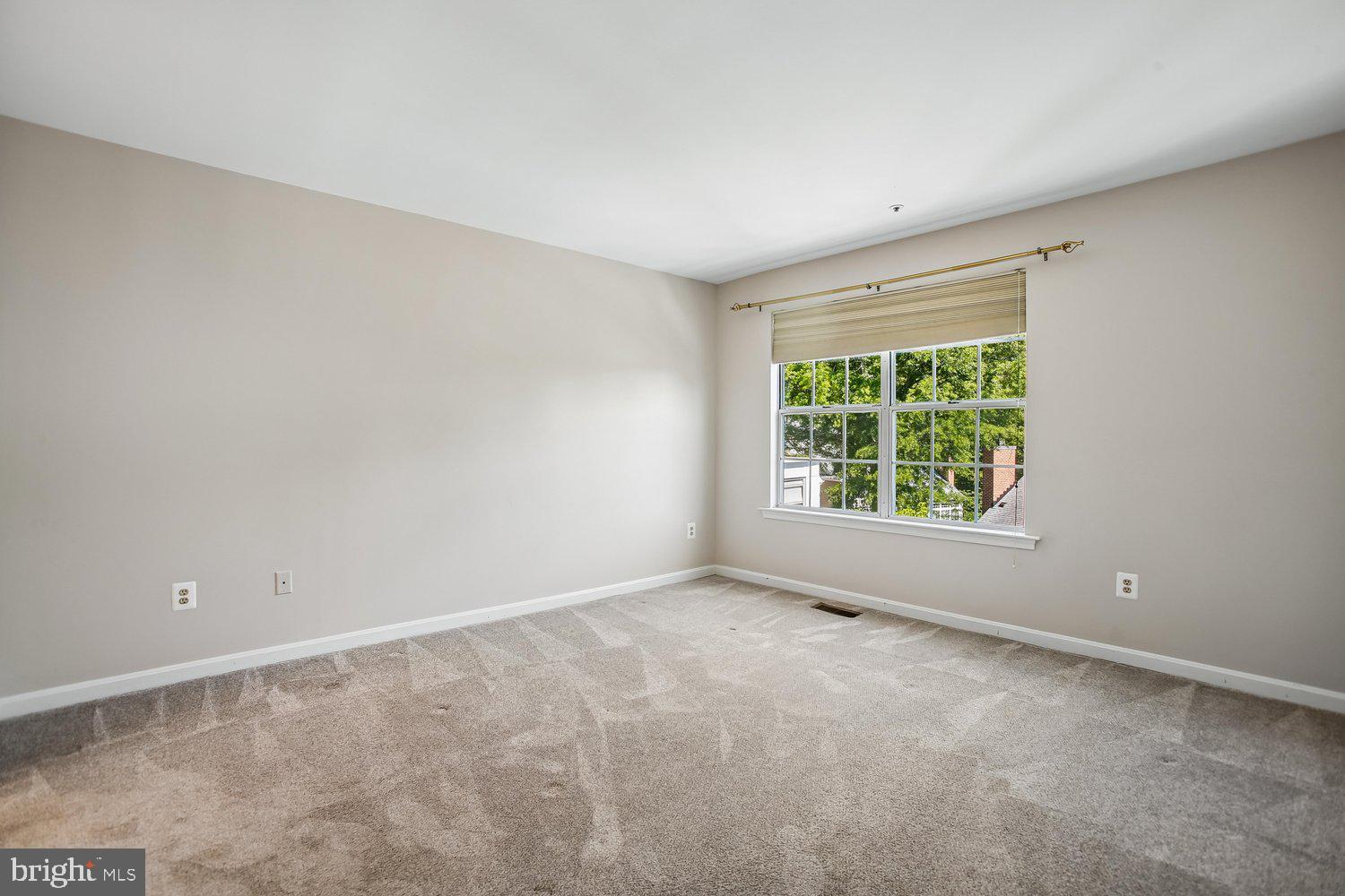 403 Fortress Way, Unit 403 Occoquan, VA 22125 - Photo 39 of 66 an empty room with windows