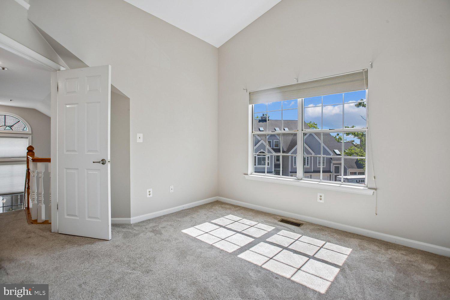 403 Fortress Way, Unit 403 Occoquan, VA 22125 - Photo 46 of 66 an empty room with windows and closet
