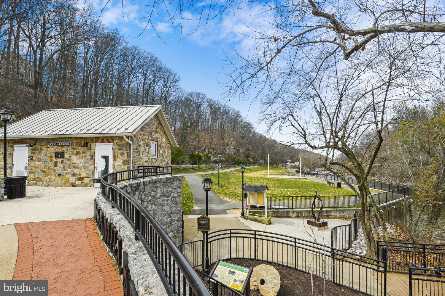 403 Fortress Way, Unit 403 Occoquan, VA 22125 - Photo 61 of 66 a view of a swimming pool with a patio