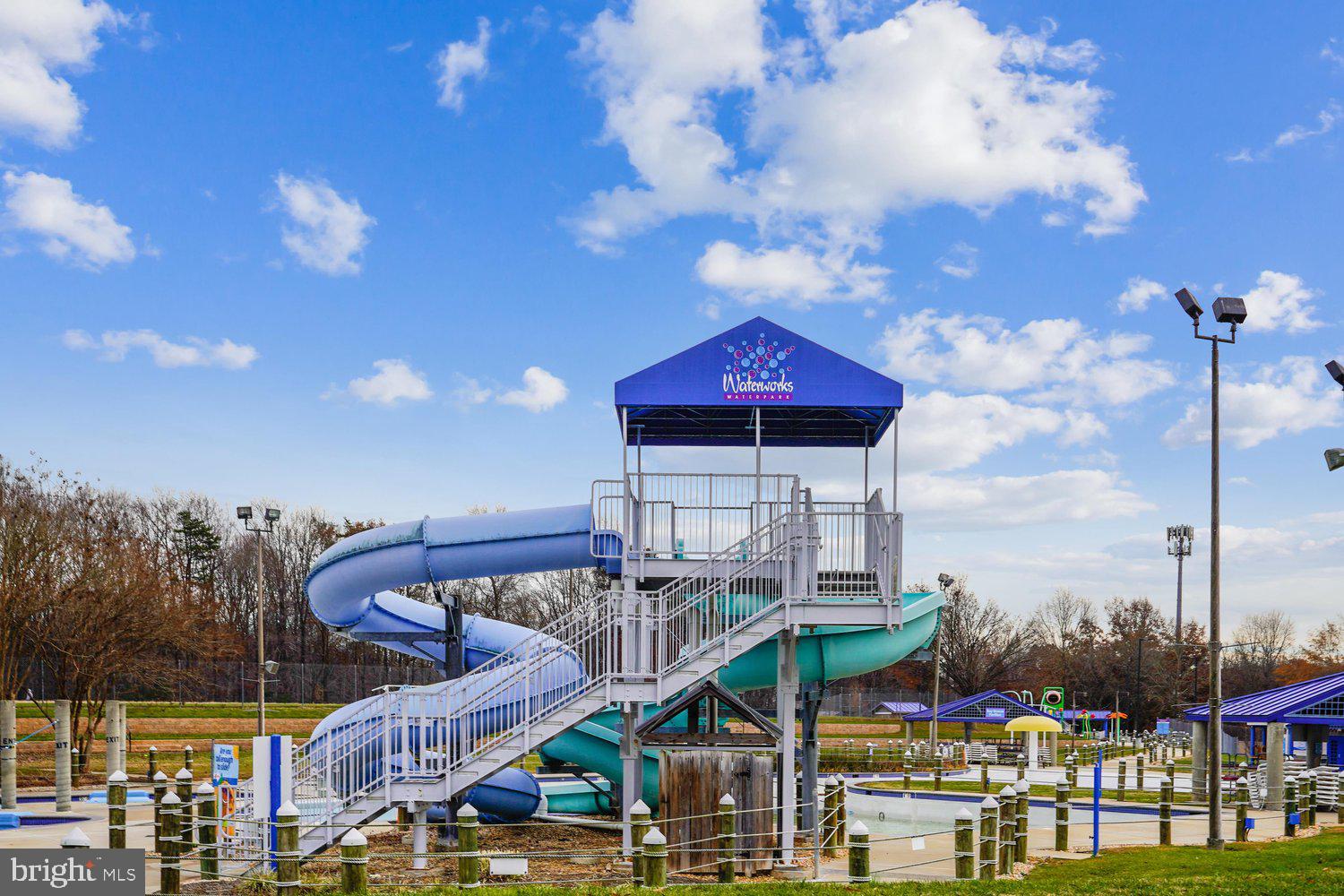 403 Fortress Way, Unit 403 Occoquan, VA 22125 - Photo 63 of 66 Exciting water slide under a bright sky.