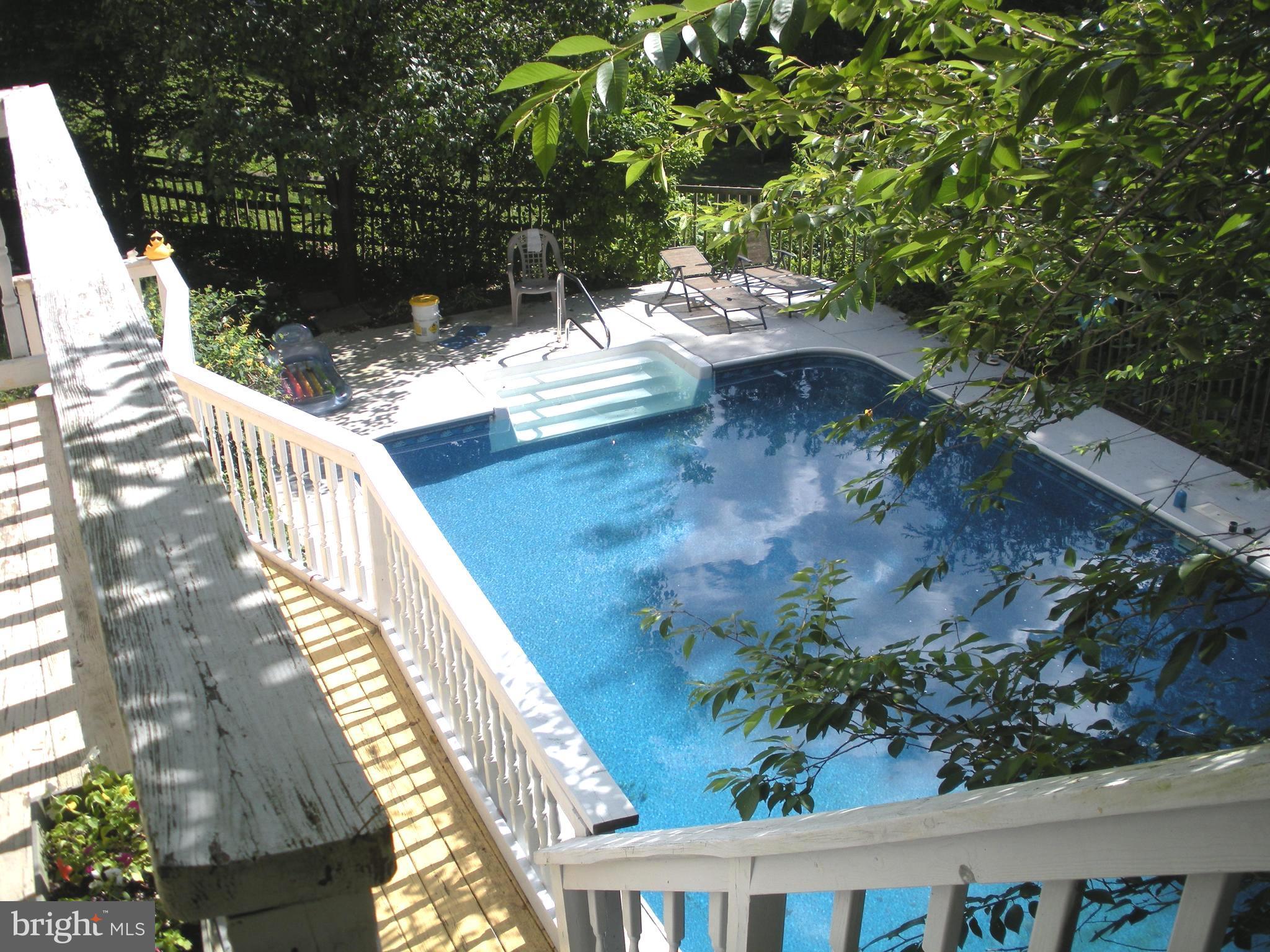 8934 Satyr Hill Road Baltimore, MD 21234 - Photo 29 of 30 In Ground Pool From Deck off 1st Floor Family Room