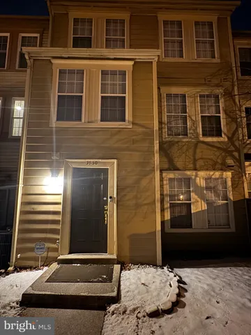 a front view of a house with a window