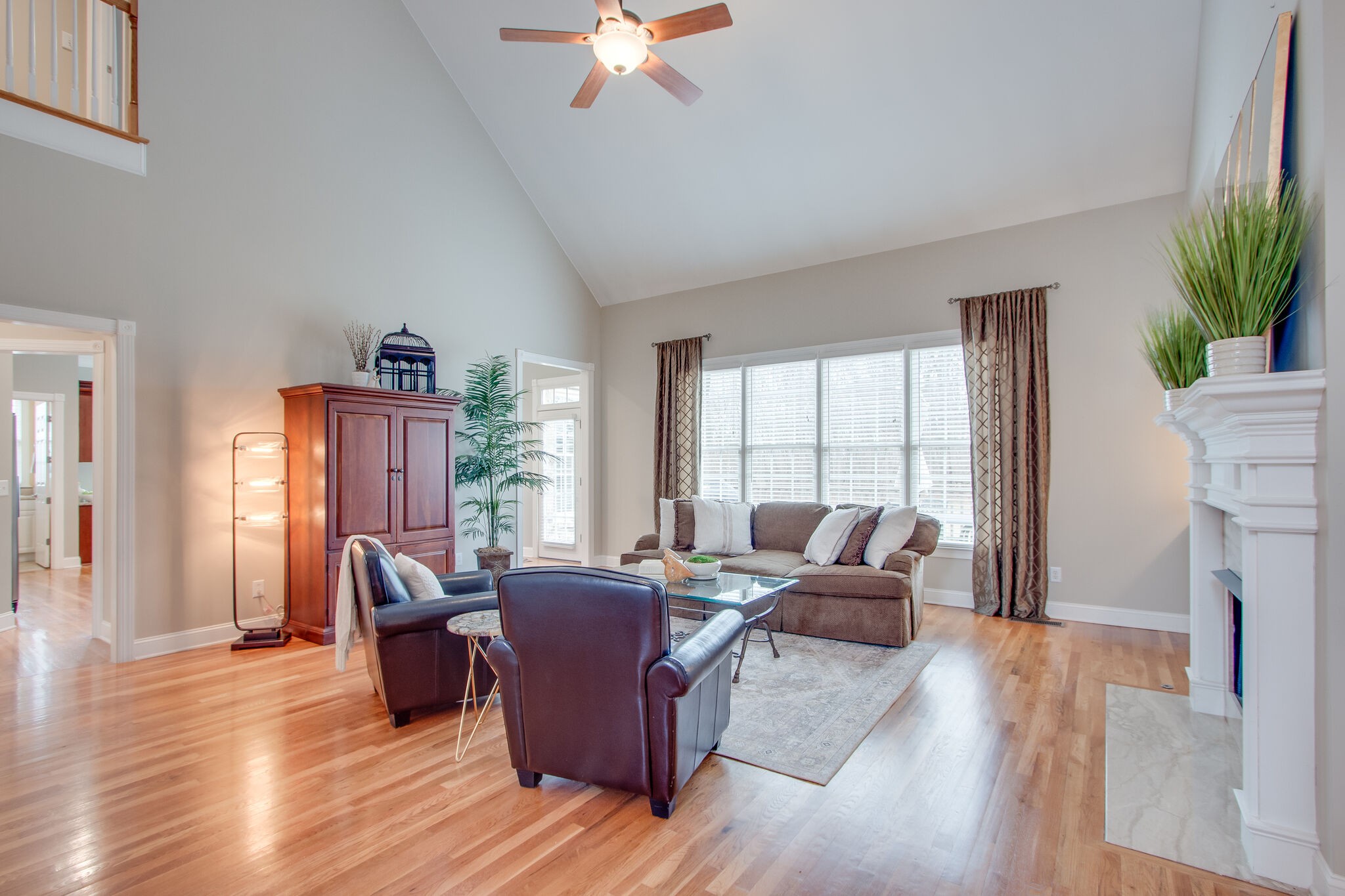 416 Sandcastle Road Franklin, TN 37069 - Photo 11 of 57 a living room with furniture or couch and a fireplace