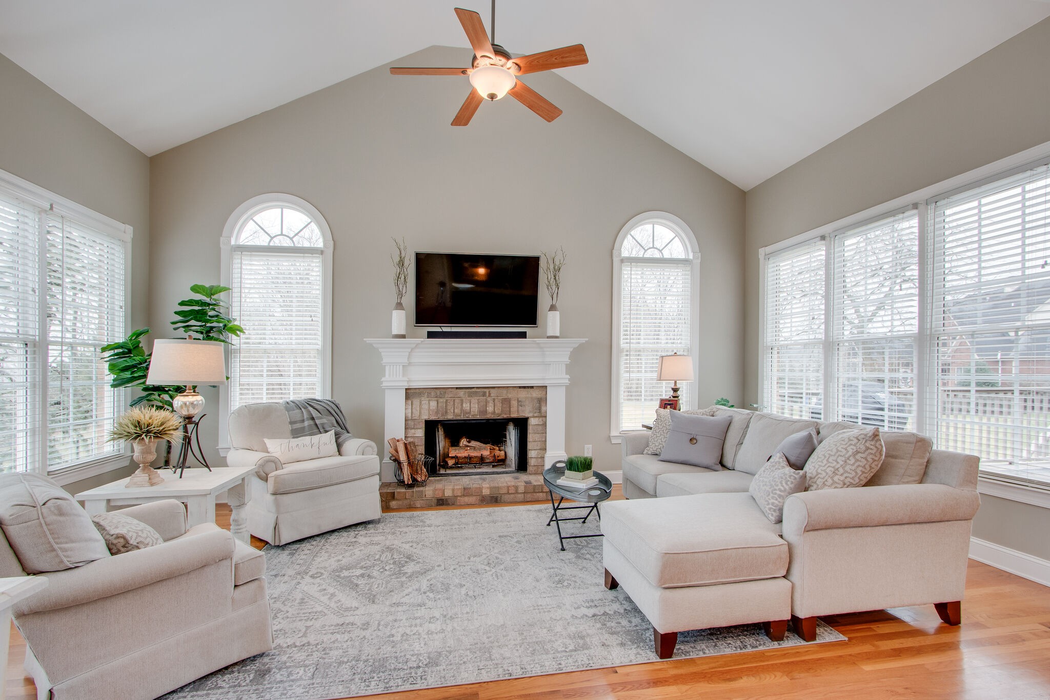 416 Sandcastle Road Franklin, TN 37069 - Photo 24 of 57 a living room with furniture fireplace and a large window