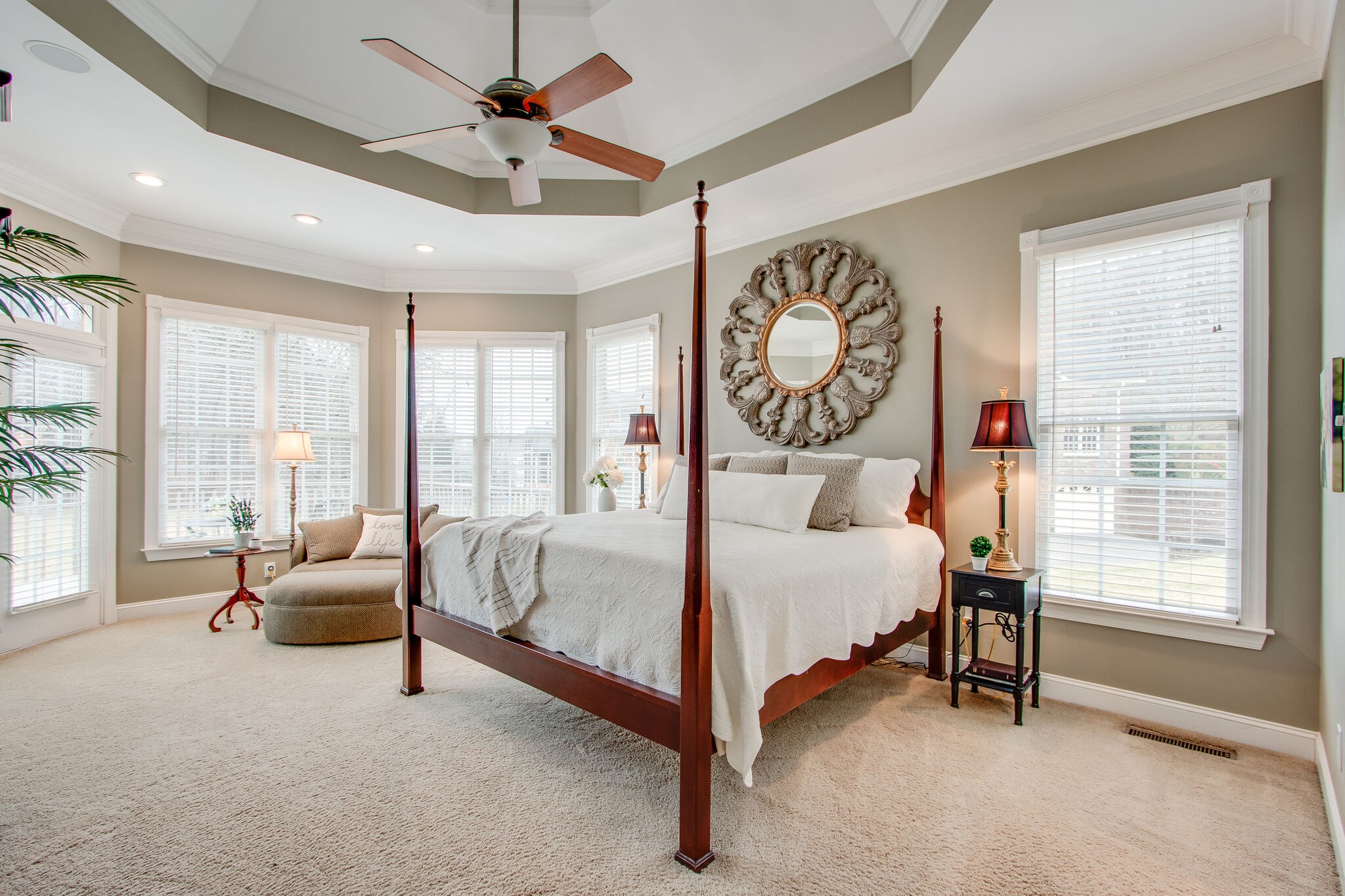 416 Sandcastle Road Franklin, TN 37069 - Photo 29 of 57 a bedroom with a bed and a chandelier