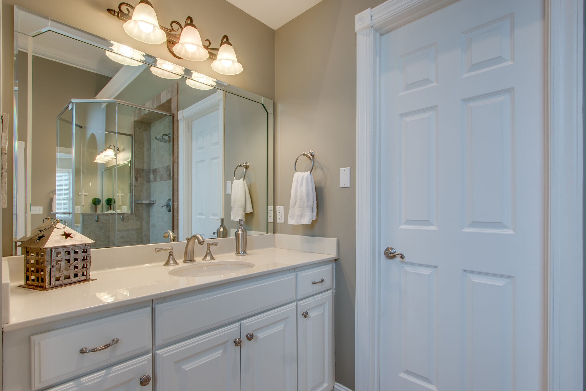 416 Sandcastle Road Franklin, TN 37069 - Photo 36 of 57 a bathroom with a double vanity sink and a mirror