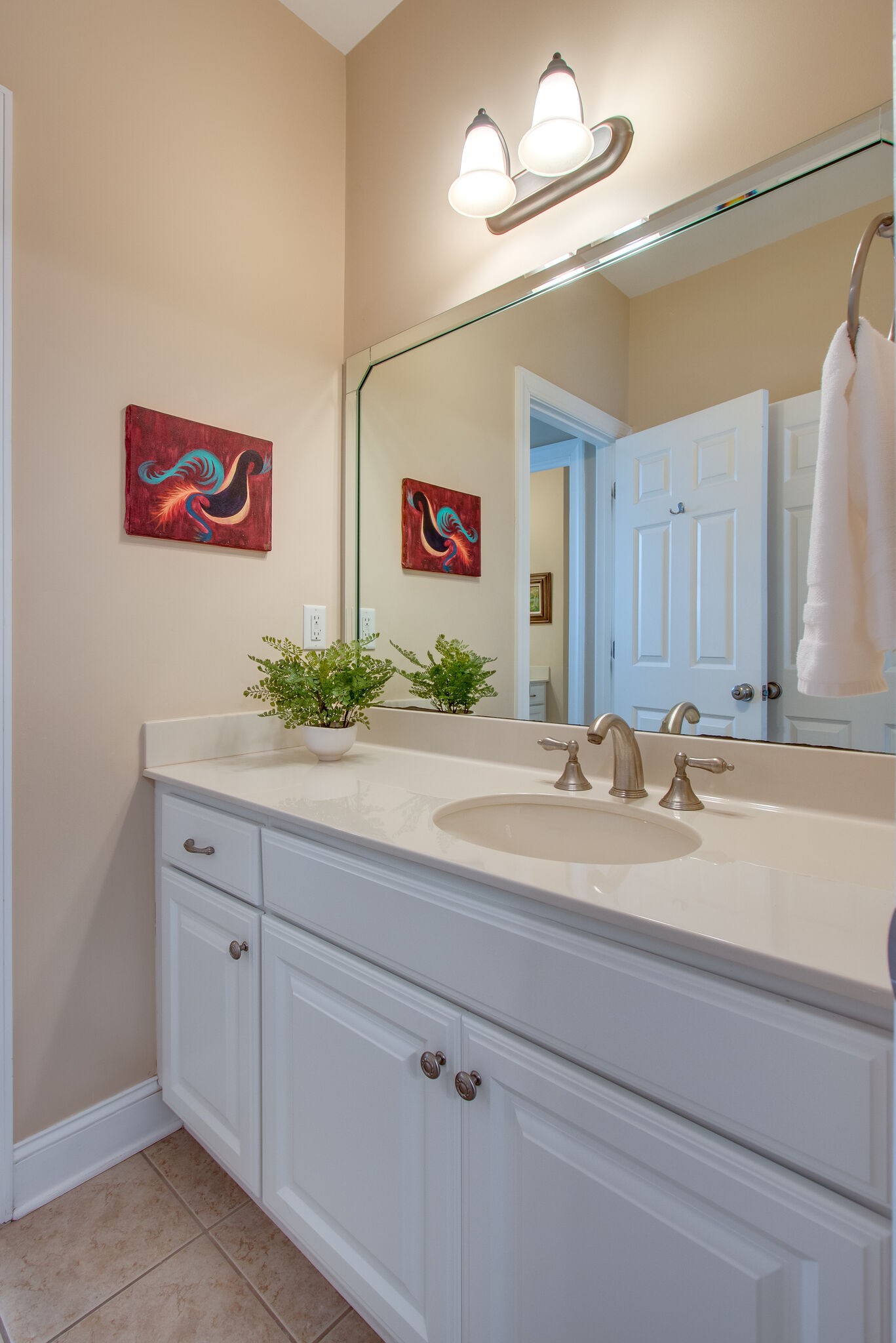416 Sandcastle Road Franklin, TN 37069 - Photo 42 of 57 a bathroom with a sink and a mirror