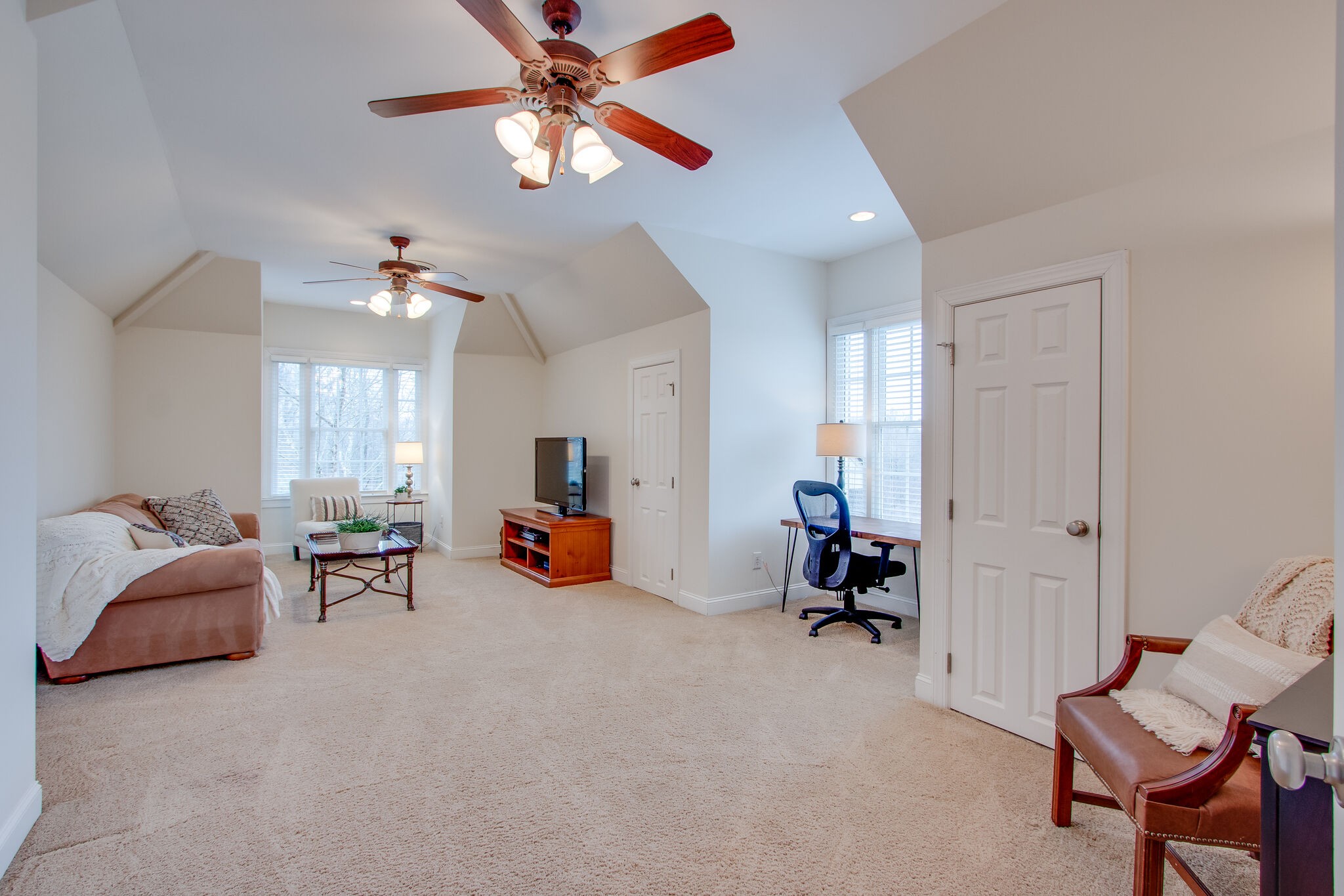416 Sandcastle Road Franklin, TN 37069 - Photo 45 of 57 a living room with furniture and a chandelier