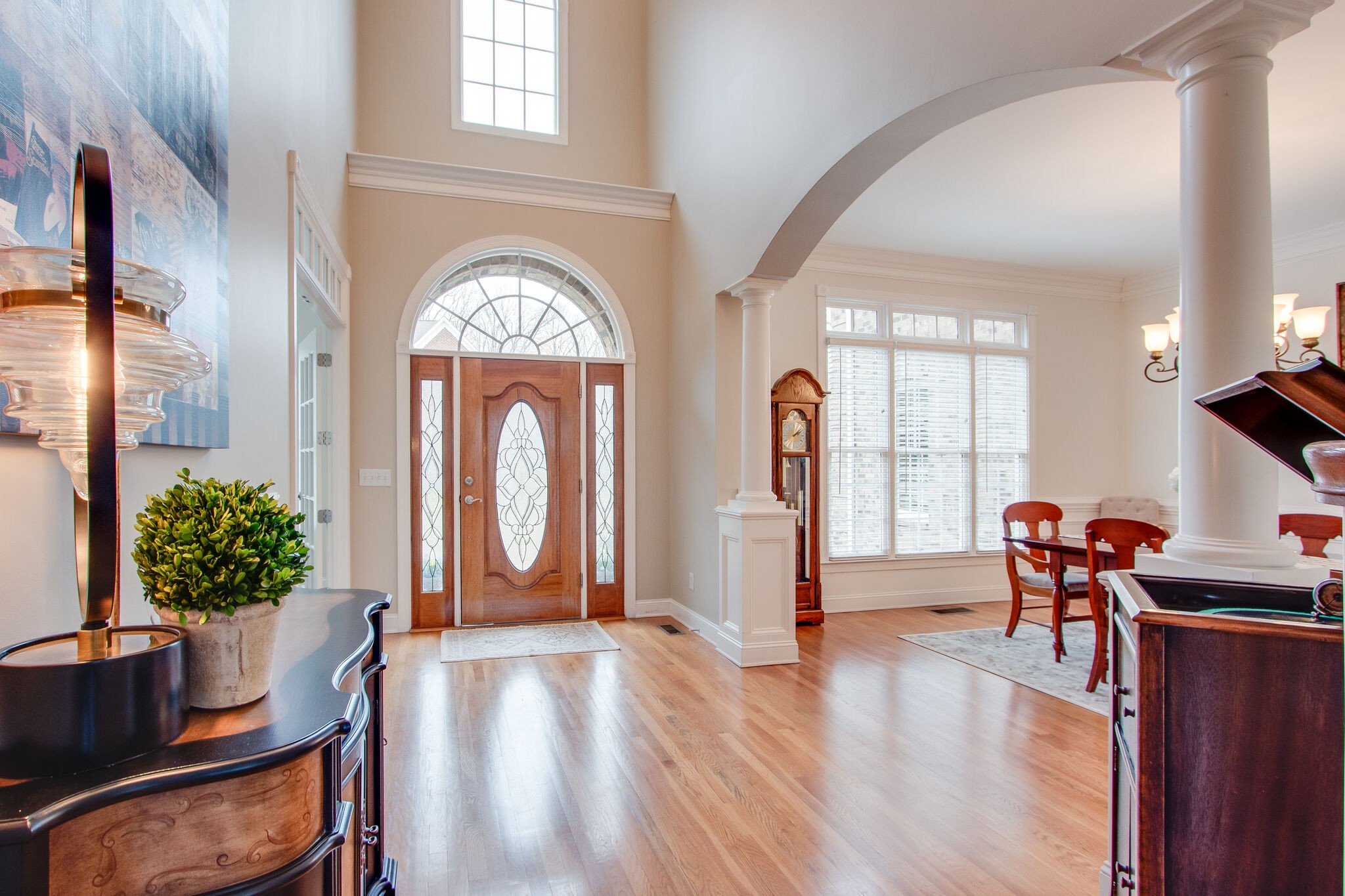 416 Sandcastle Road Franklin, TN 37069 - Photo 5 of 57 a view of a hallway with furniture window and wooden floor