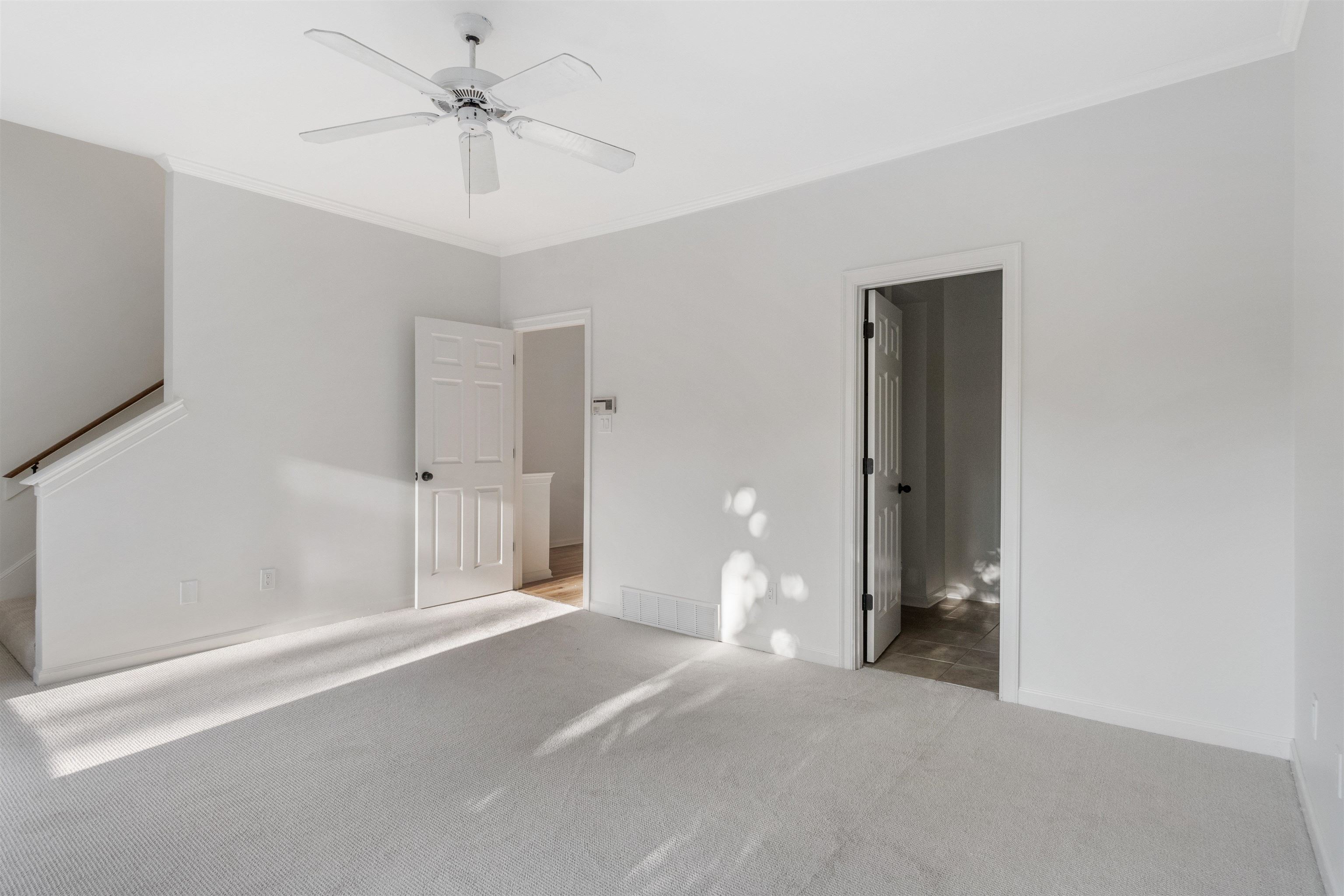 931 Harbor View Drive Memphis, TN 38103 - Photo 11 of 21 a view of a room with a ceiling fan and entryway