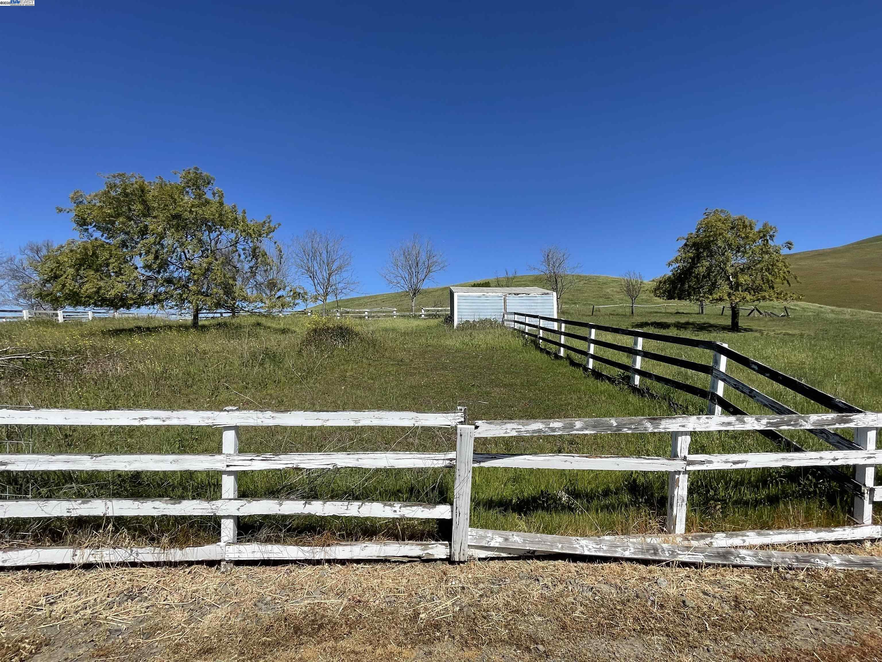 3343 Little Valley Road Sunol, CA 94586 - Photo 13 of 23 a view of a house with a yard