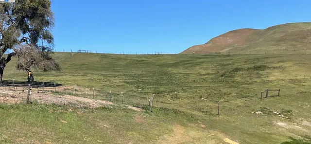 a view of a lake with a mountain in the background