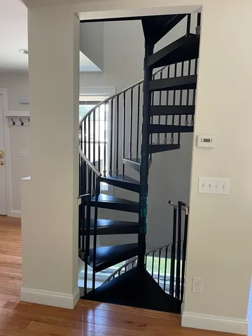 a view of entryway with wooden floor