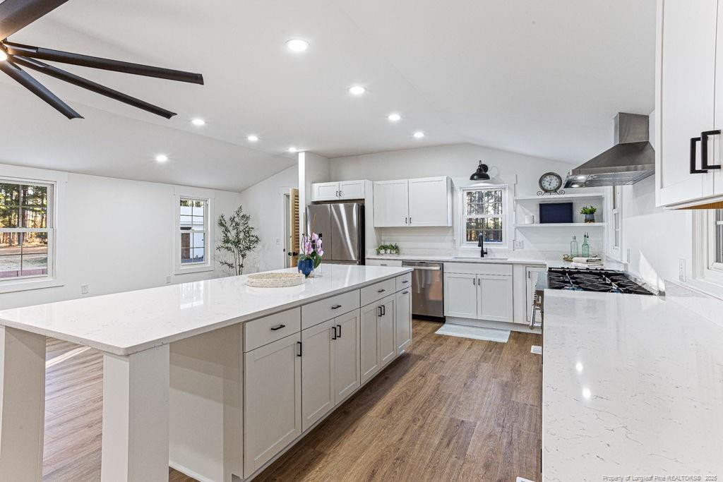 447 T T Johnson Road Carthage, NC 28327 - Photo 22 of 49 a large kitchen with stainless steel appliances lots of counter top space