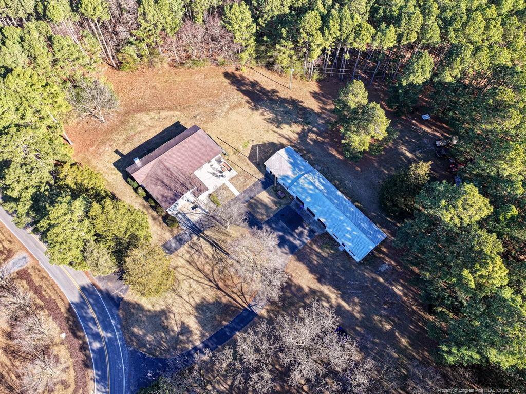 447 T T Johnson Road Carthage, NC 28327 - Photo 3 of 49 a view of a house with a yard