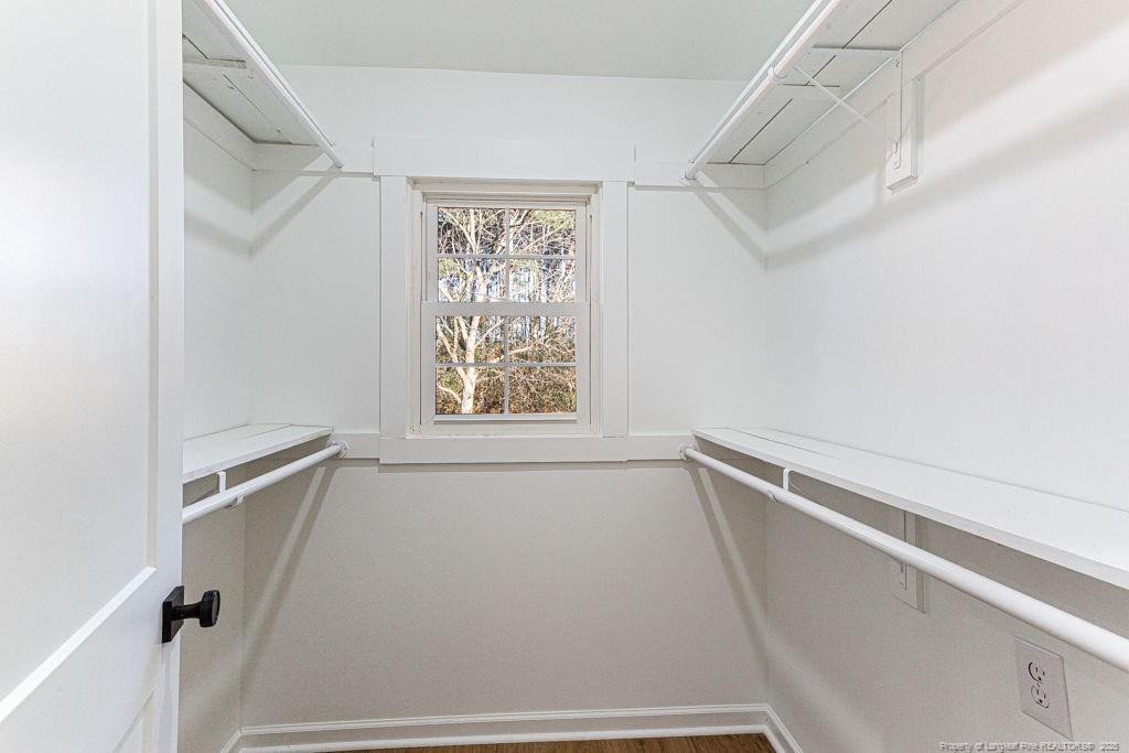 447 T T Johnson Road Carthage, NC 28327 - Photo 32 of 49 a view of a room with racks on the wall