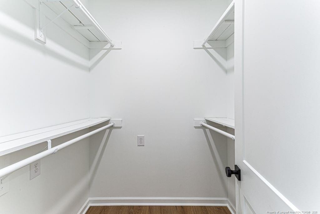 447 T T Johnson Road Carthage, NC 28327 - Photo 33 of 49 a bathroom with a window and a shower