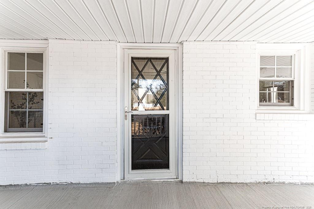 447 T T Johnson Road Carthage, NC 28327 - Photo 43 of 49 a view of a door and a window