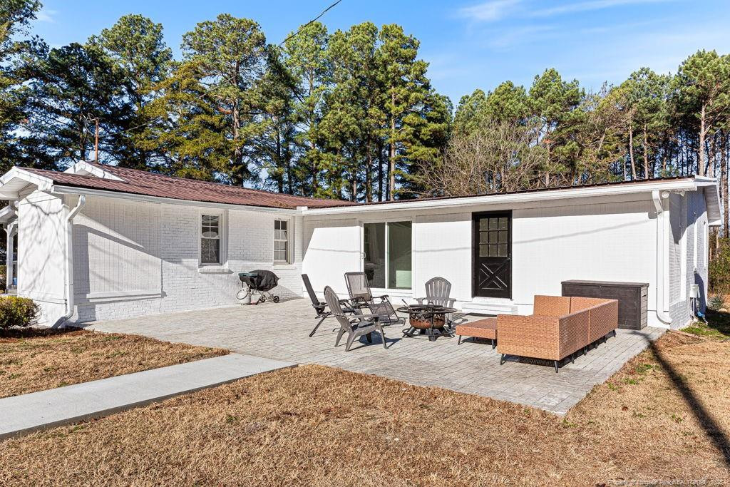 447 T T Johnson Road Carthage, NC 28327 - Photo 49 of 49 a view of a backyard with furniture