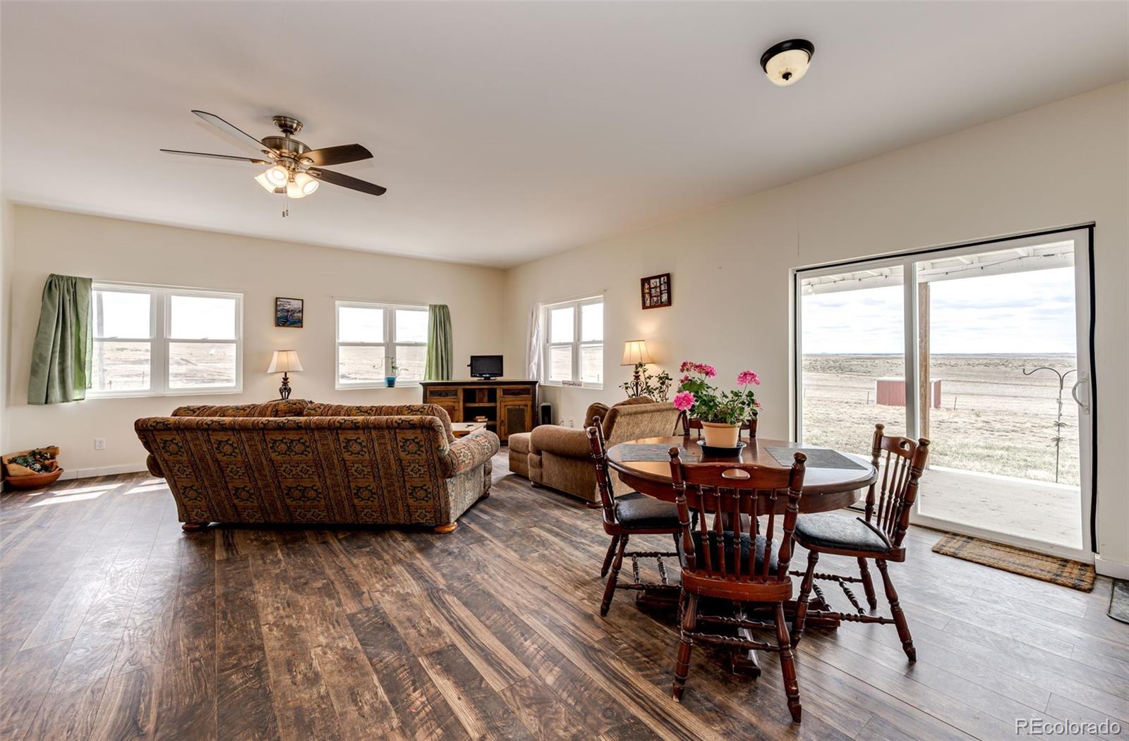 26101 Flower Circle Simla, CO 80835 - Photo 26 of 48 a living room with furniture and a large window