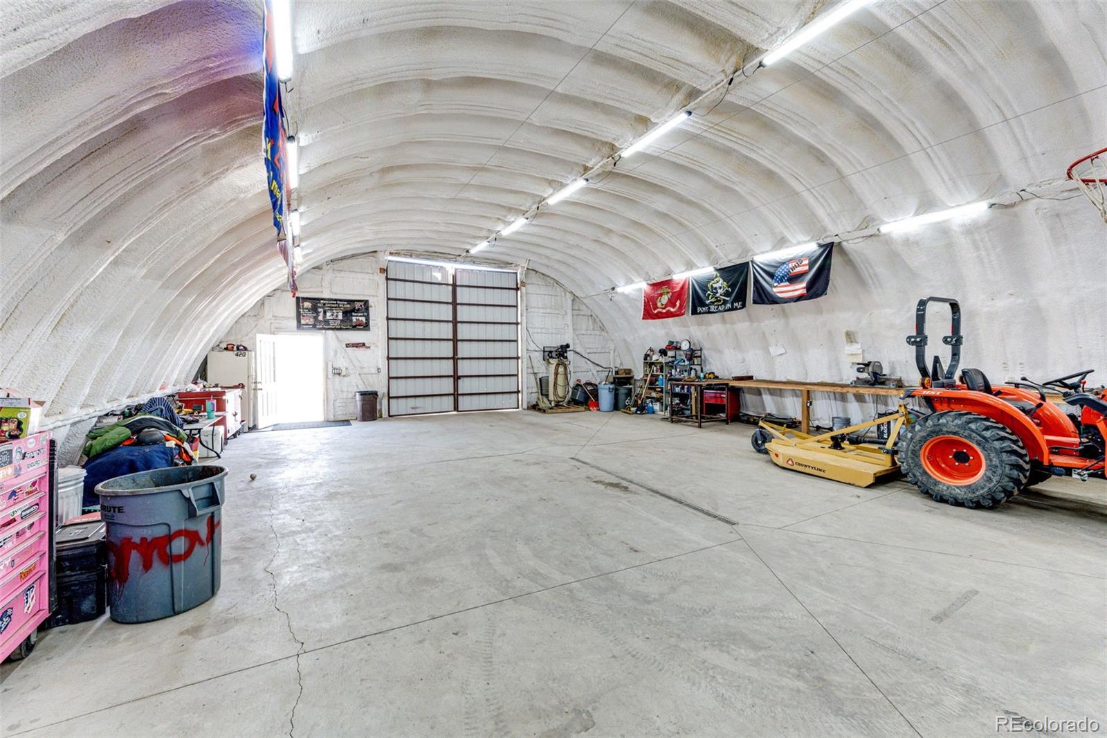 26101 Flower Circle Simla, CO 80835 - Photo 41 of 48 a view of a garage with toys