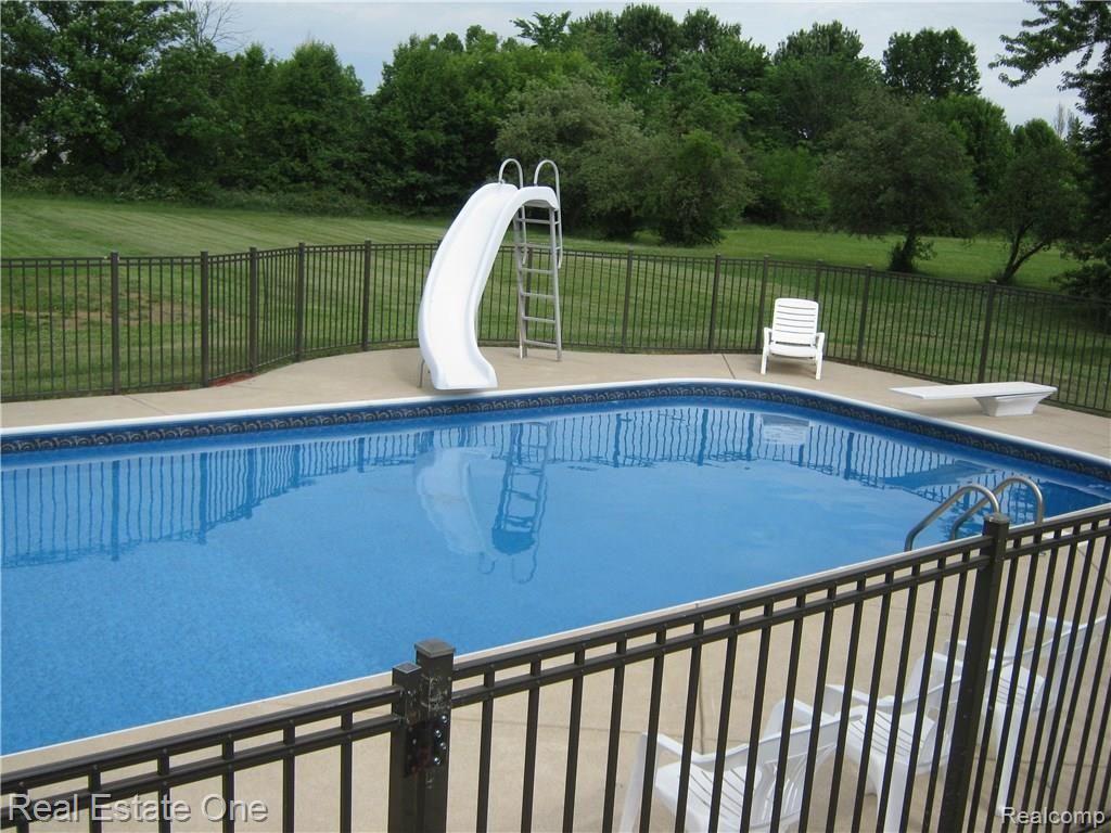 23880 Hall Road Trenton, MI 48183 - Photo 3 of 50 Fenced in In ground pool with new pool liner 2016!