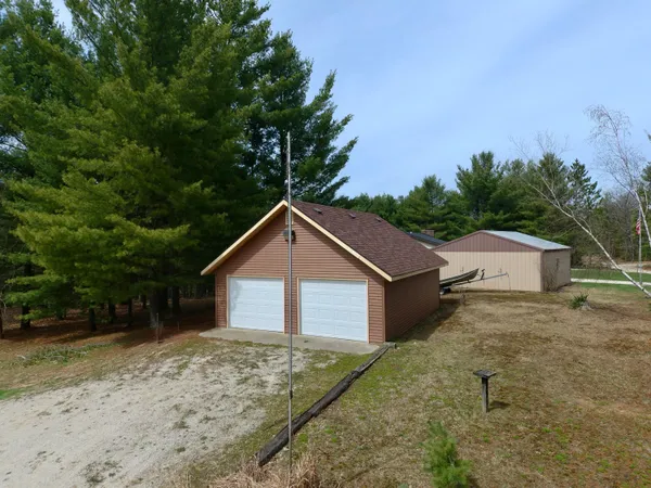 $209,900 | 7816 West Windsong Avenue, Baldwin, MI 49304