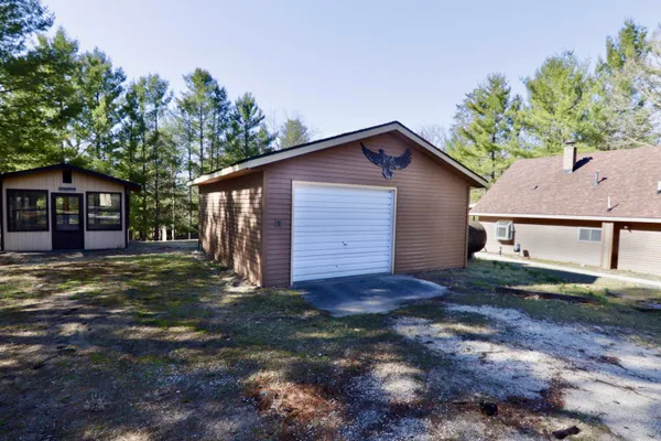 $209,900 | 7816 West Windsong Avenue, Baldwin, MI 49304