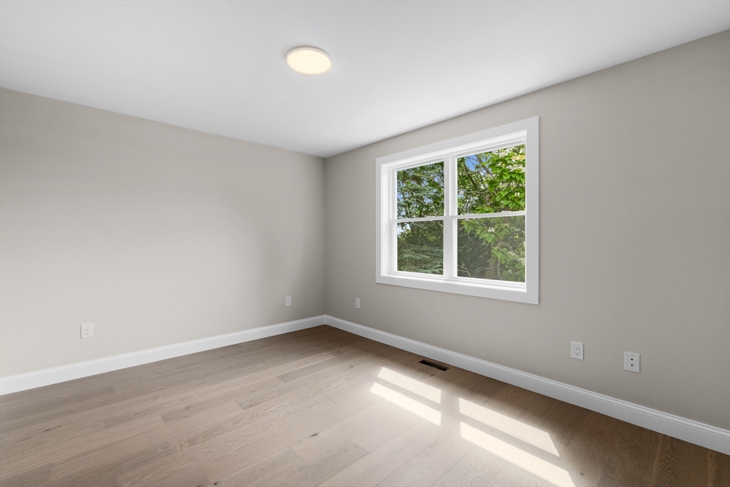 122 Stowe Street, Unit 122 Fall River, MA 02720 - Photo 22 of 26 an empty room with a window