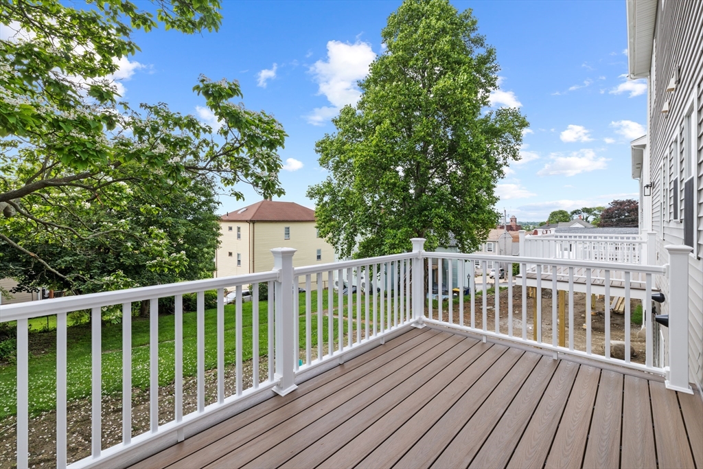122 Stowe Street, Unit 122 Fall River, MA 02720 - Photo 23 of 26 a view of a wooden roof deck