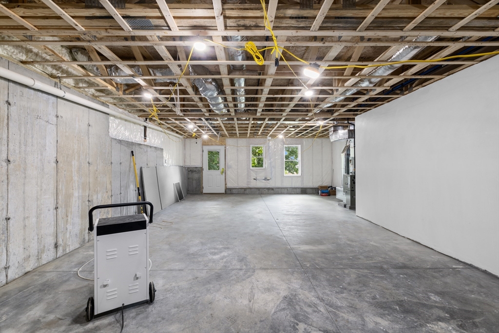 122 Stowe Street, Unit 122 Fall River, MA 02720 - Photo 25 of 26 a view of a room with gym equipment