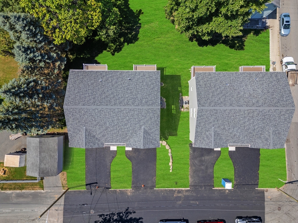 122 Stowe Street, Unit 122 Fall River, MA 02720 - Photo 26 of 26 an aerial view of a house with garden space and street view