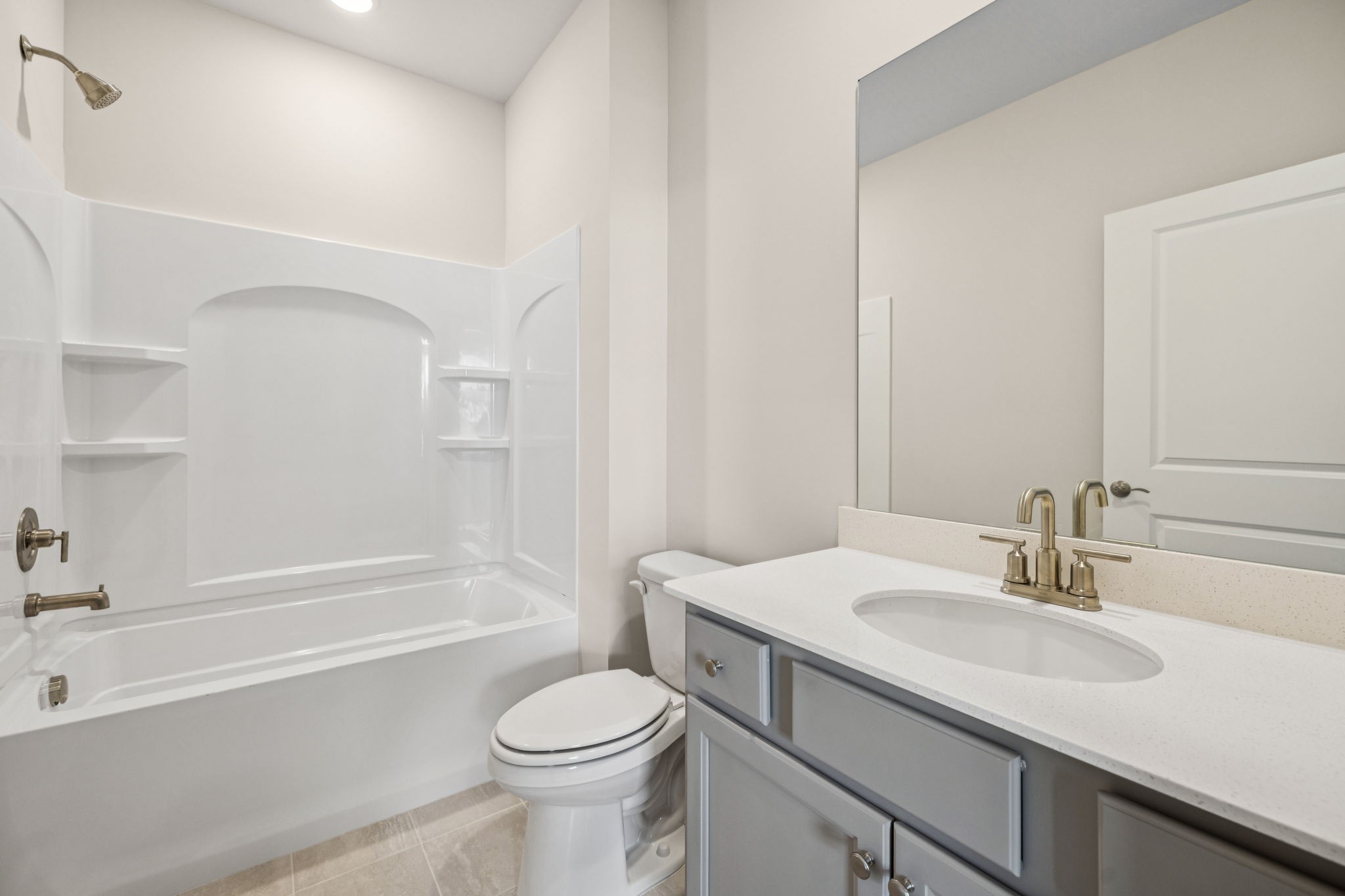 8140 Rocky Fork Almaville Road Smyrna, TN 37167 - Photo 19 of 43 a bathroom with a sink a toilet and a bathtub