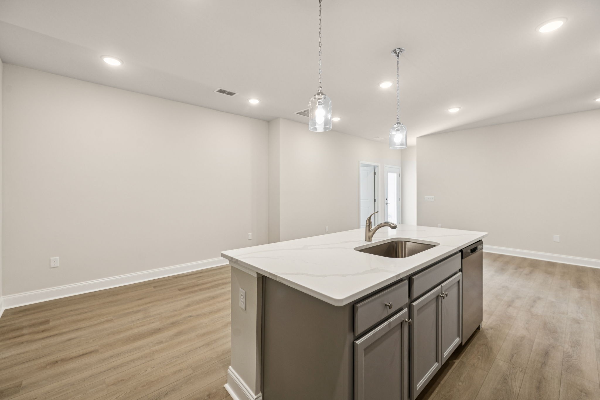 8140 Rocky Fork Almaville Road Smyrna, TN 37167 - Photo 24 of 43 a kitchen with a sink and wooden floor